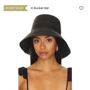 Never worn- Janessa Leone Felix hat.